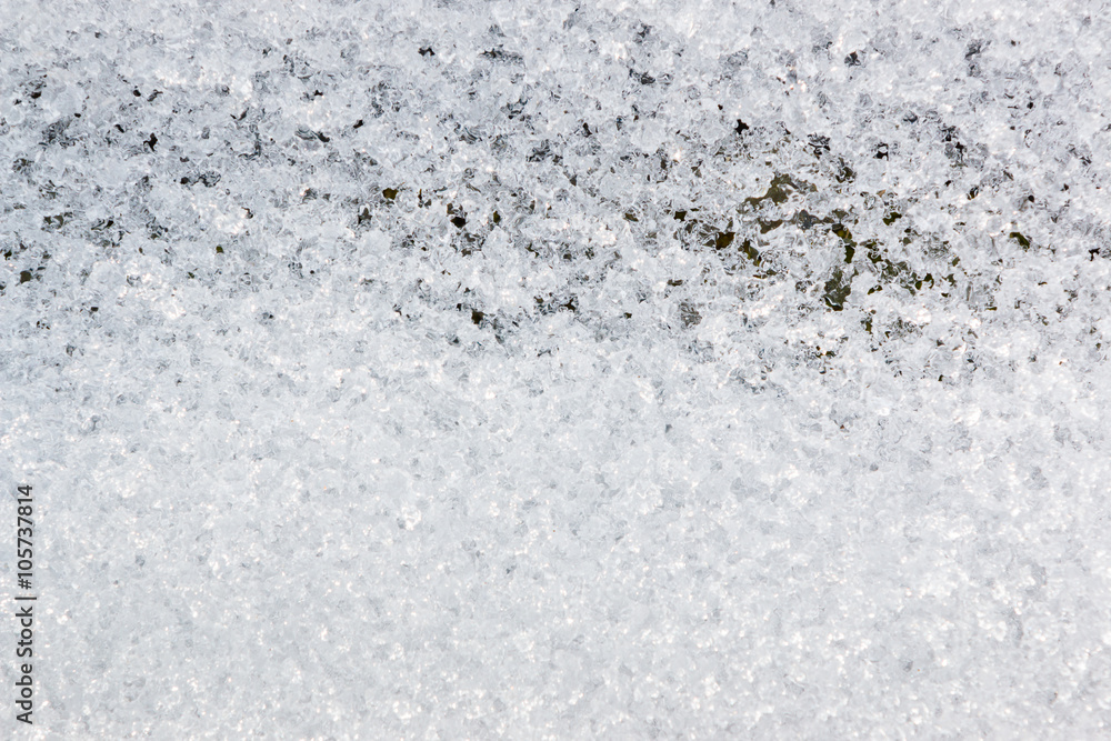 Obraz premium close up snow texture thawing snow.