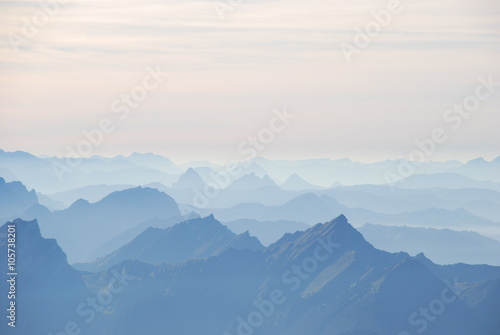 Mountain range in haze Swiss alps © maurusasdf