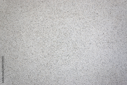 Texture of white gravel concrete wall.