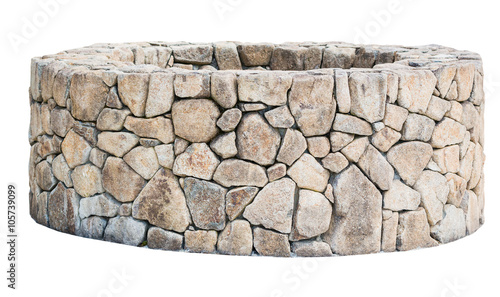 Traditional Ancient stone well isolated on white.
