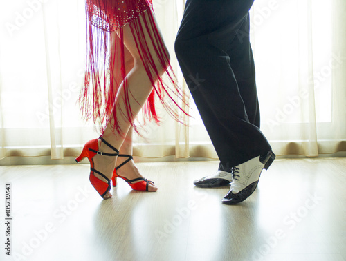 Legs of man and woman dancing