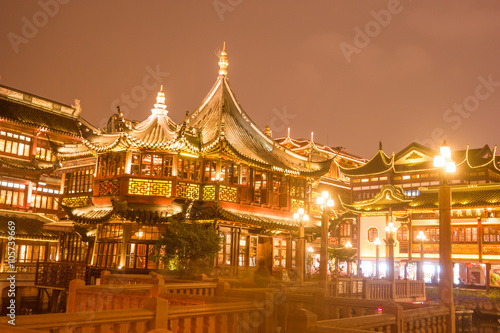 Chinese traditional Yuyuan Garden building scenery in night illumination, Shanghai