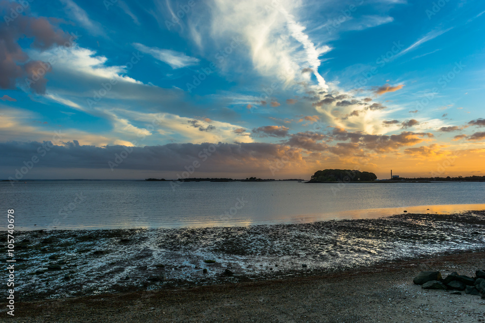 Westport, Connecticut. New England. East Coast Sunset in the Long Island Sound during low tide Westport, Connecticut. New England. East Coast Sunset in the Long Island Sound during low tide