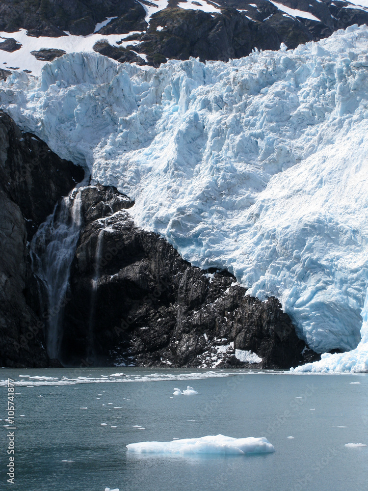 White glacier and black rocks White glacier and black rocks