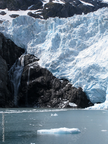 White glacier and black rocks