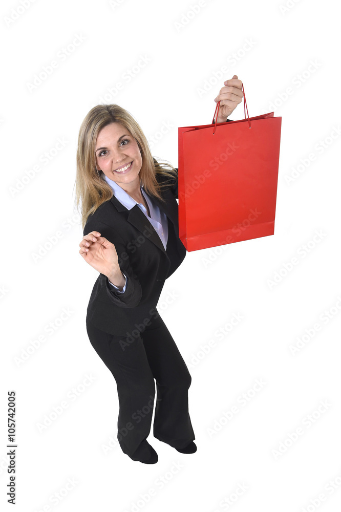 young happy beautiful woman in business suit in excited face expression holding red shopping bag young happy beautiful woman in business suit in excited face expression holding red shopping bag