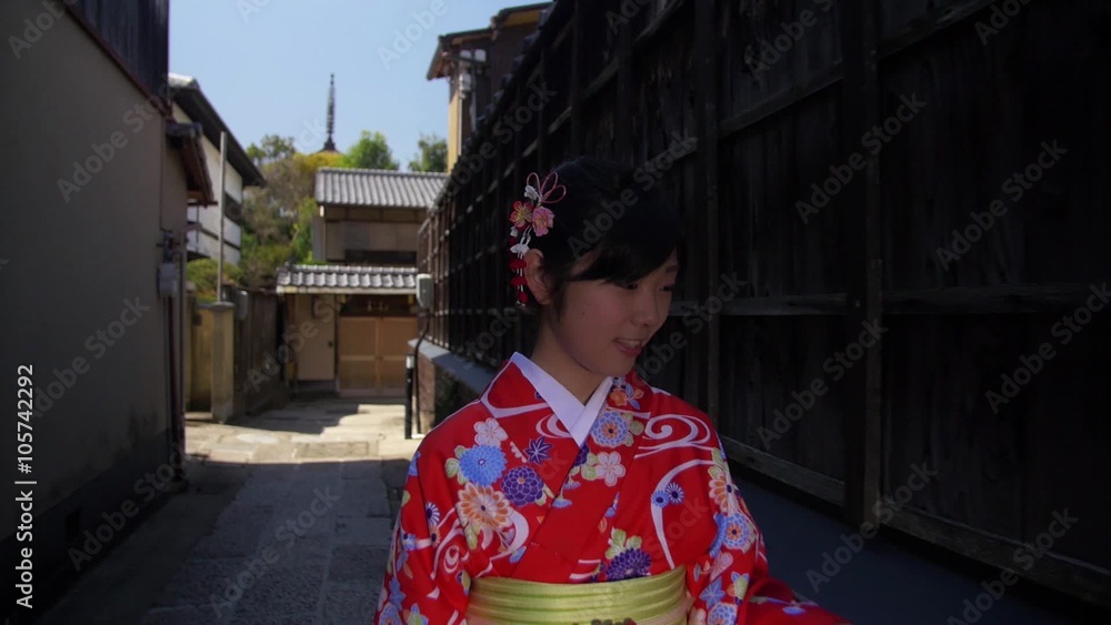 Beautiful young Japanese Girl wearing Kimono explores Kyoto streets Beautiful young Japanese Girl wearing Kimono explores Kyoto streets