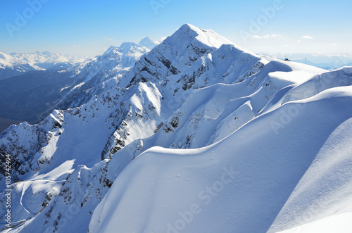 Россия, Сочи, пики вершин горнолыжного курорта Роза Хутор. Пик горы Аибга зимой photo