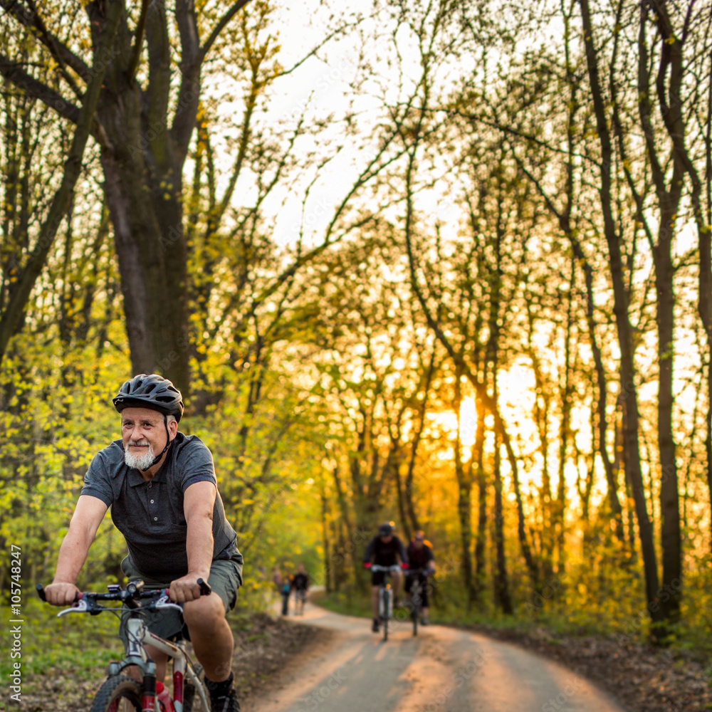 Fototapeta premium Senior man on his mountain bike outdoors