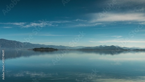 Wallpaper Mural Mirror Water of Lake in Summer Morning. Pan, 4K. Torontodigital.ca