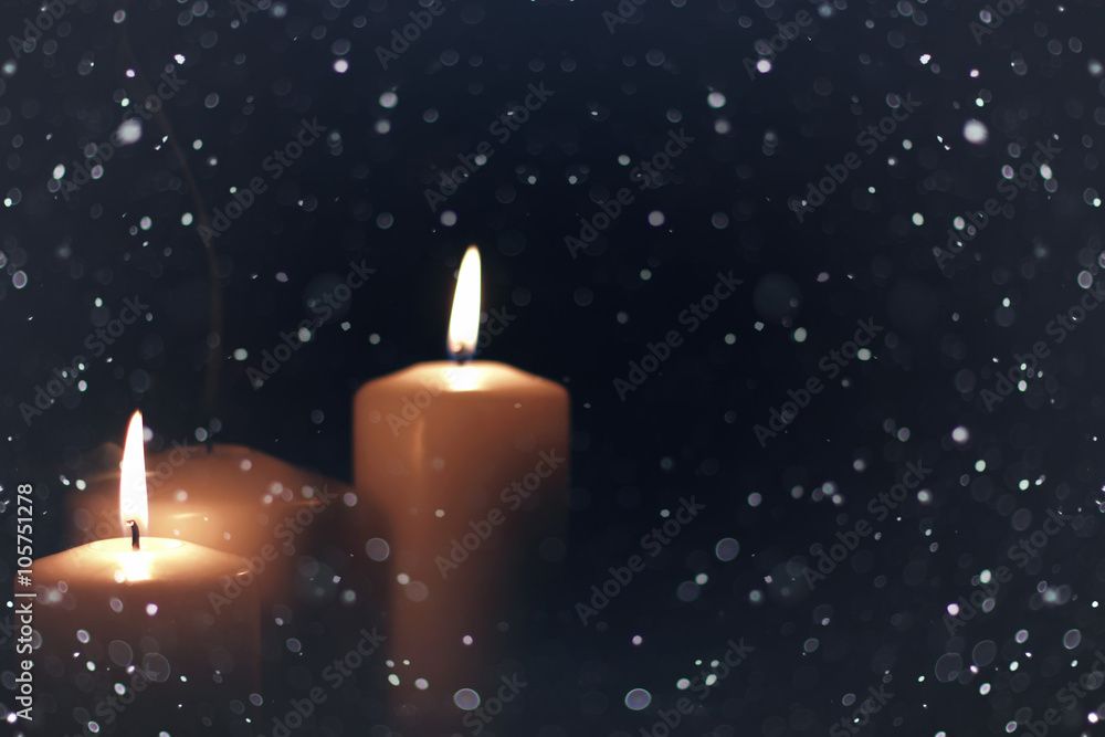 candle light isolated black with snow candle light isolated black with snow