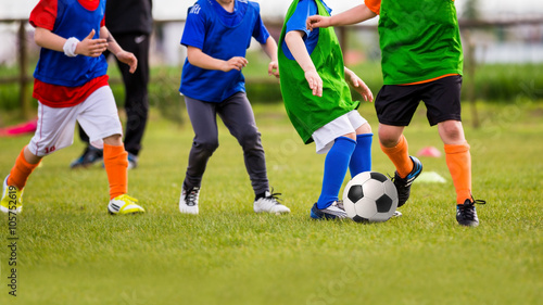 Fototapeta Naklejka Na Ścianę i Meble -  Kids play soccer football game