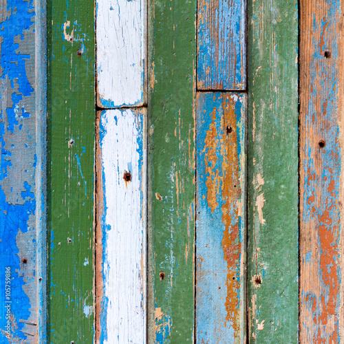 textured background of old wooden barn boards of different colors. square photo with copy space for text © Andrey Solovev