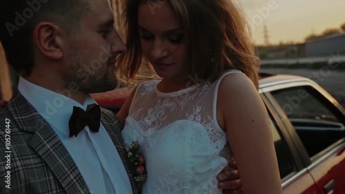 Newlyweds in the sunrays slowmotion