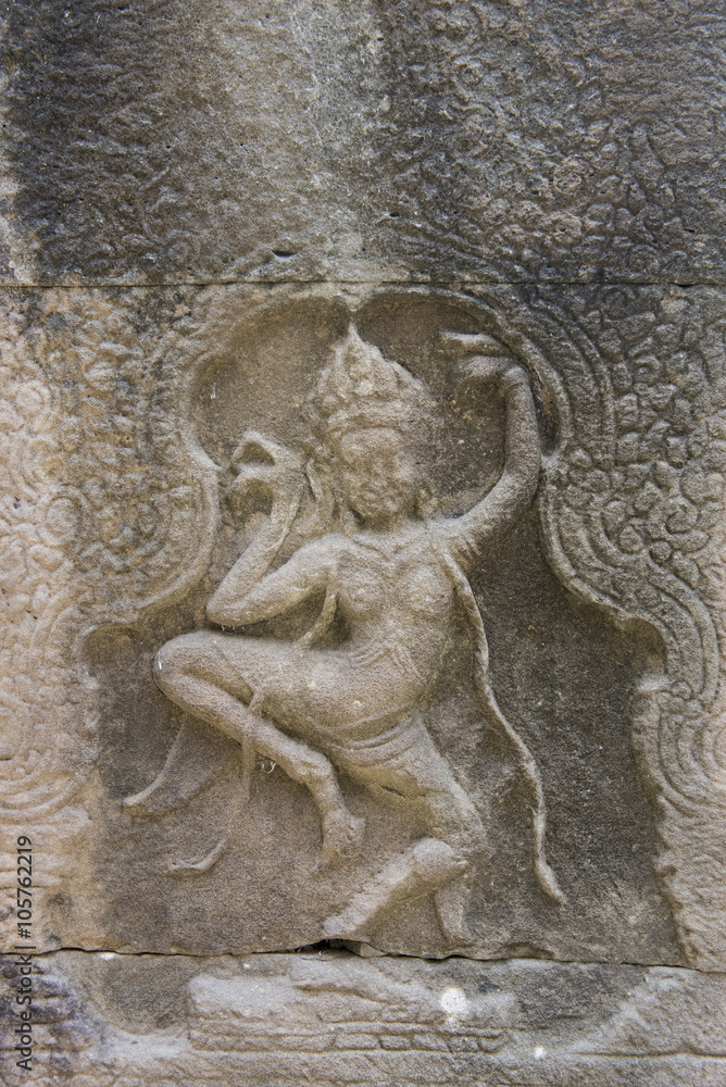 Dancing girls carved in the sandstone walls of the Banteay Kdei