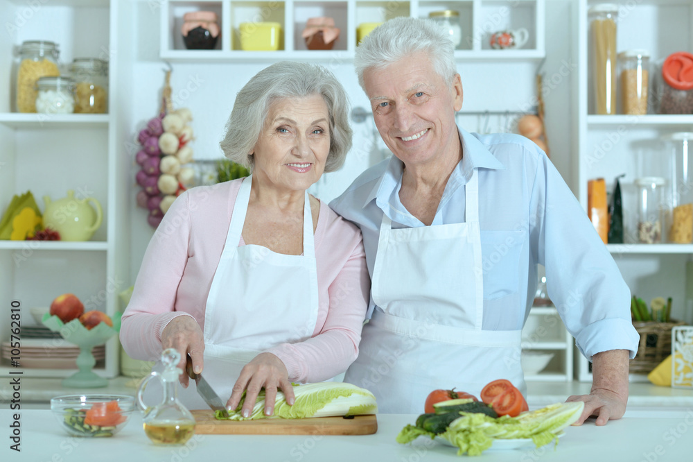 senior man and woman  in the kitchen