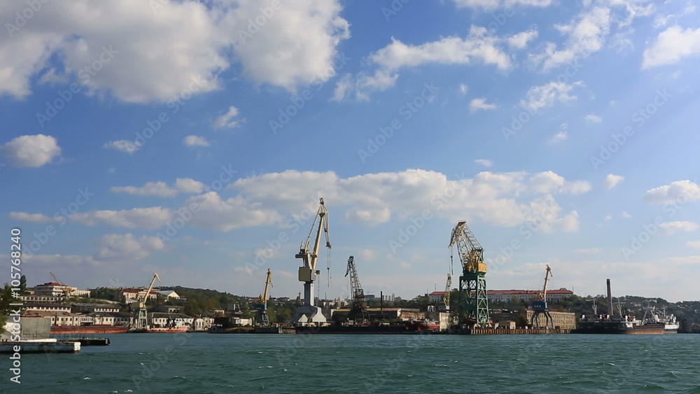 Water view at base of Russian Black Sea Fleet, and floating cranes working in Sevastopol bay Water view at base of Russian Black Sea Fleet, and floating cranes working in Sevastopol bay