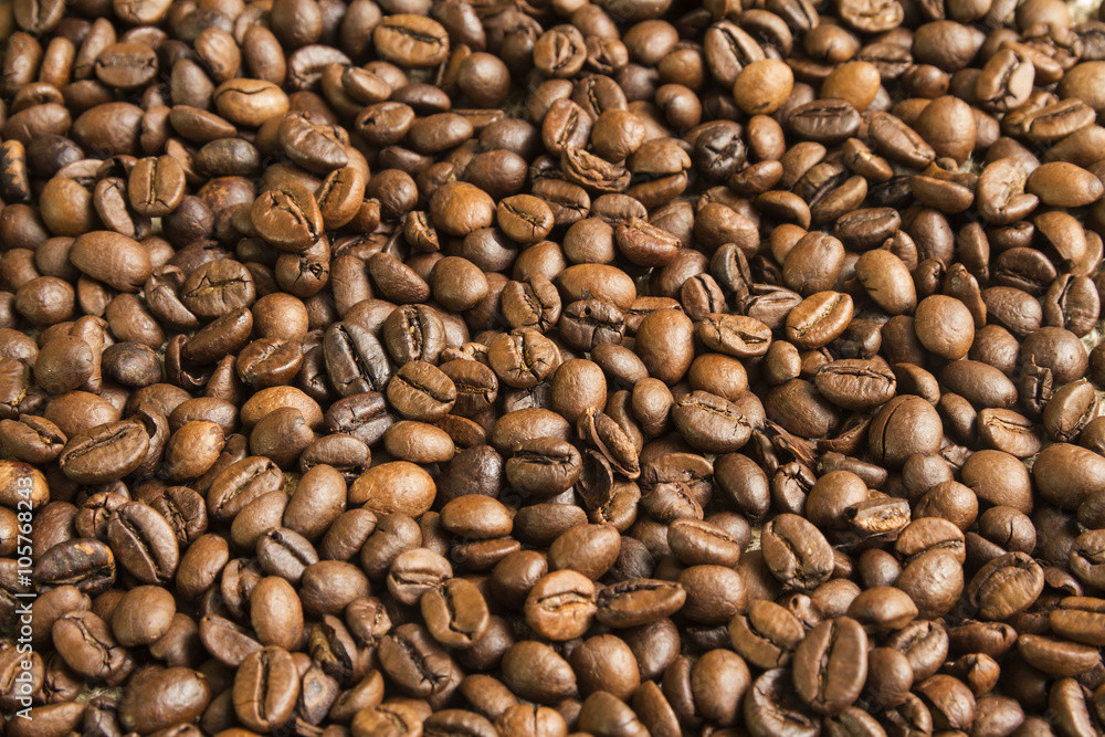 coffee beans on the texture of the bag from the fibers coffee beans on the texture of the bag from the fibers