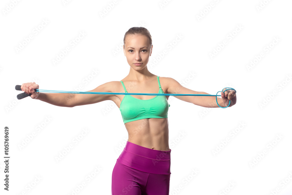 young woman with healthy sporty figure holding skipping rope young woman with healthy sporty figure holding skipping rope