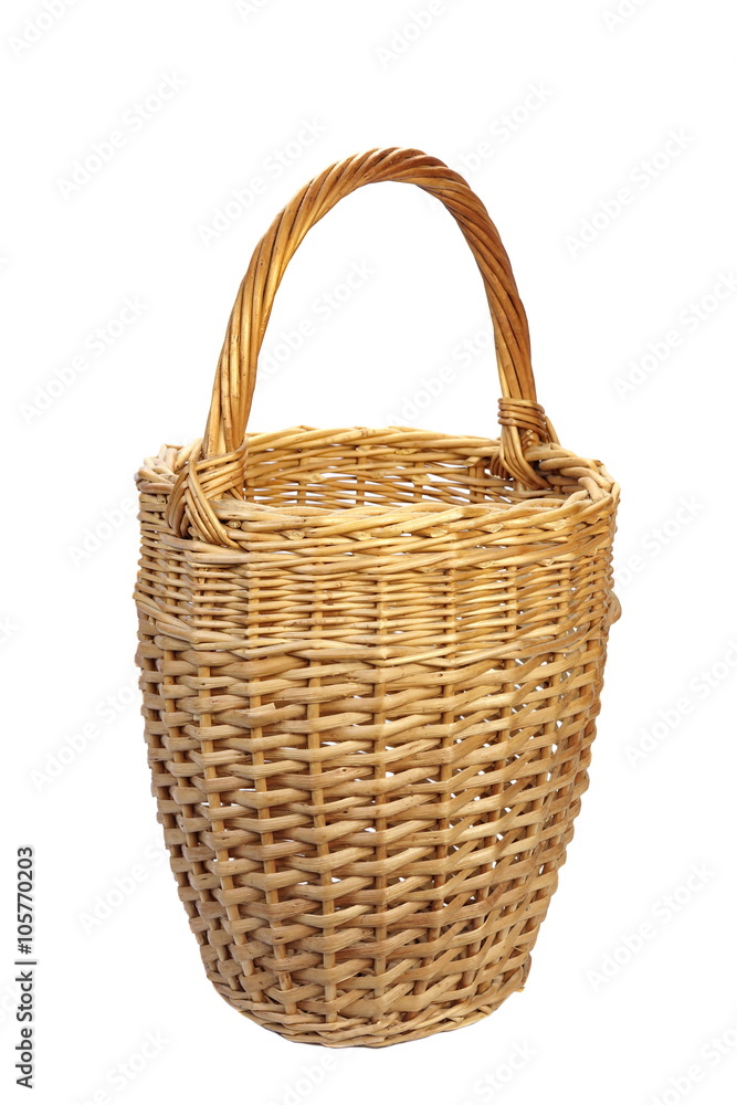 Fototapeta premium Empty Tall Vintage Wicker Basket Isolated