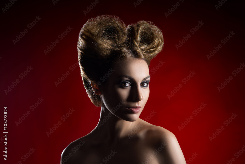 Fototapeta premium Portrait of a beautiful woman with a bizarre haircut