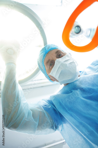 Professional anesthesiologist is serving the patient photo