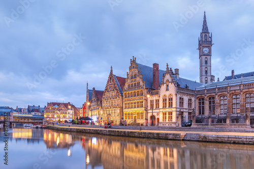 Picturesque medieval buildings on the quay Graslei and Leie river at Ghent town in the evening  Belgium
