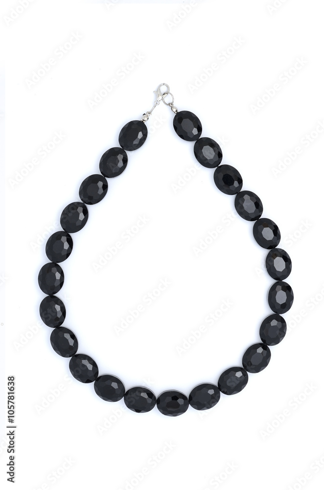 Obraz premium Necklace with black stones isolated
