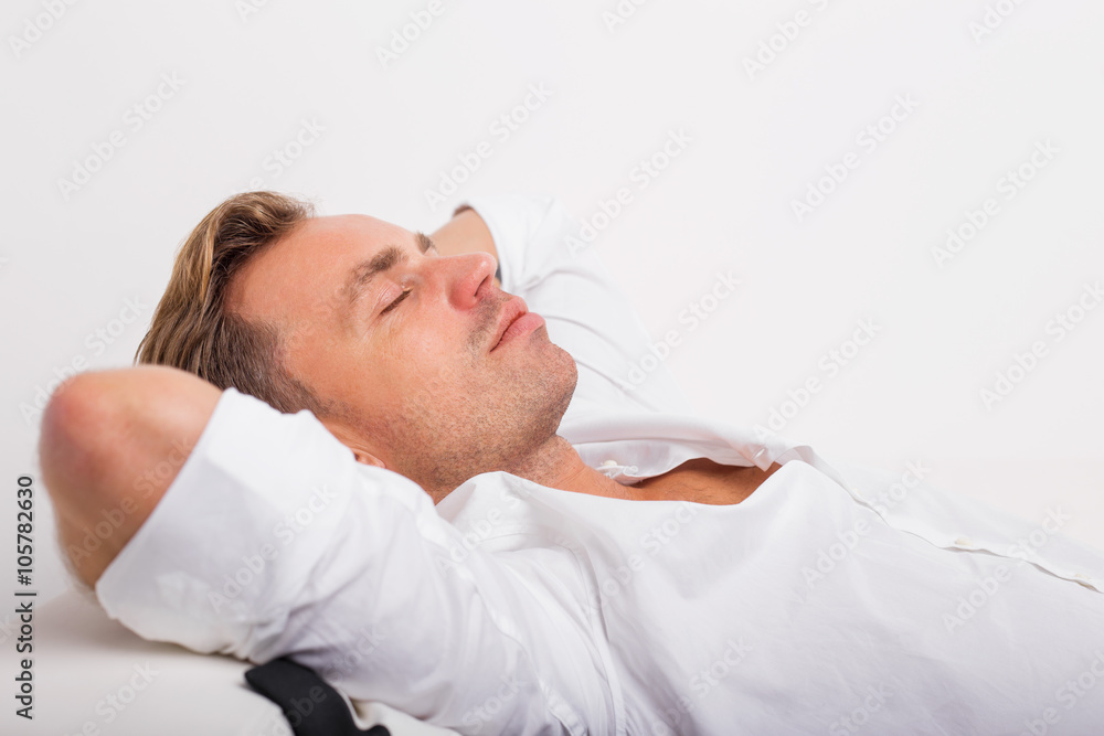 Man lying down and resting Man lying down and resting