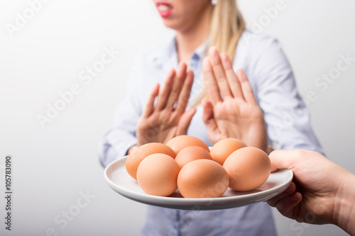 Woman refusing to eat eggs