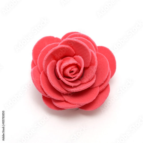 Foto Artificial flower isolated on white