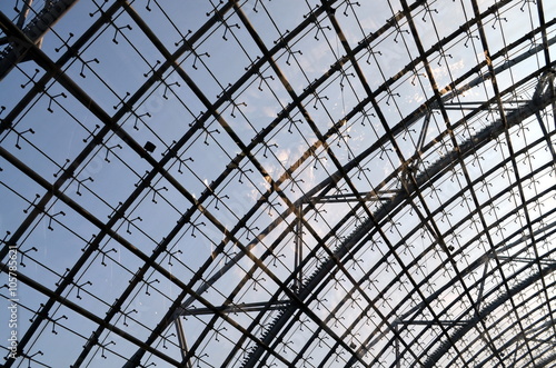 glass roof of an exhibition hall with blue sky