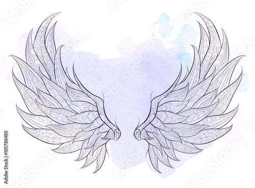 Patterned wings on the grunge background. African / indian / totem / tattoo design. It may be used for design of a t-shirt, bag, postcard, a poster and so on.  