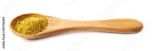 Wooden spoon of curry isolated
