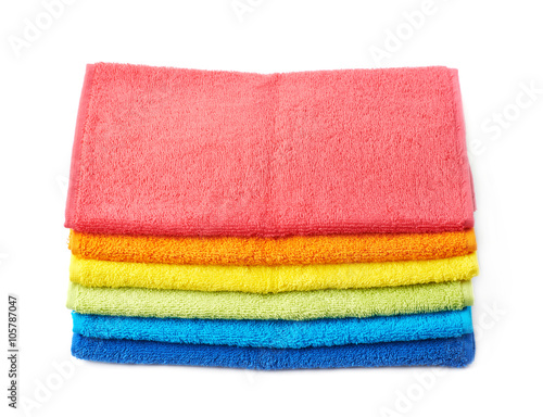 Rainbow colored pile of towels isolated