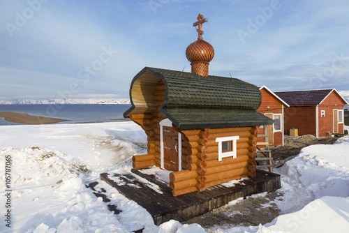 Orthodox chapel on the coast of the Barents Sea. The polar region, Russia