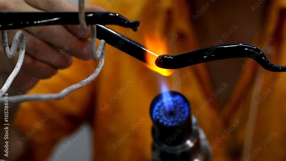 Hand glass master during the manufacturing process / Glass handmade creative handmade glass figurines close-up Hand glass master during the manufacturing process / Glass handmade creative handmade glass figurines close-up