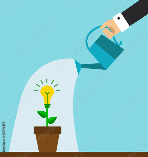 hand holding a watering can and water the plants symbolizing the business idea