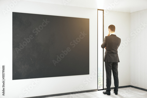 Blackboard and thinking man © Who is Danny
