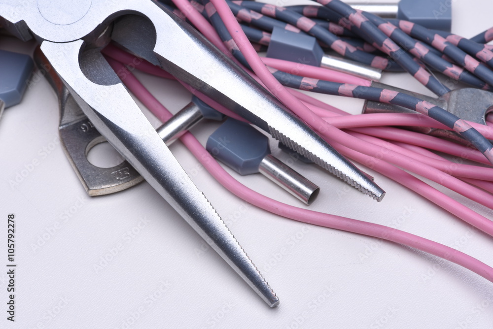 Electrical tools, component and cables on metal surface Electrical tools, component and cables on metal surface