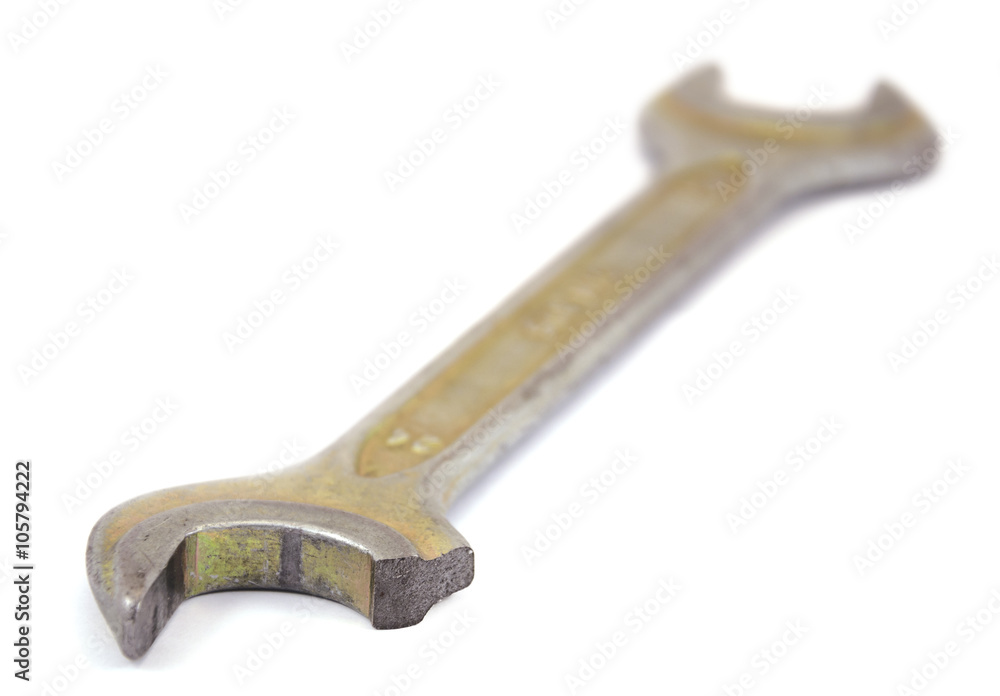 Broken wrench on a white background with small depth of field Broken wrench on a white background with small depth of field
