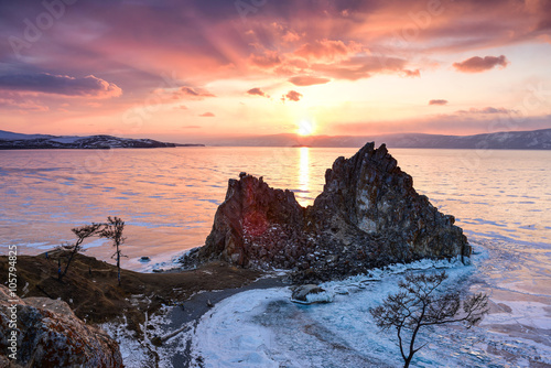 Stunning sunset above the frozen surface of the lake Baikal on the Olkhon iceland © jingel