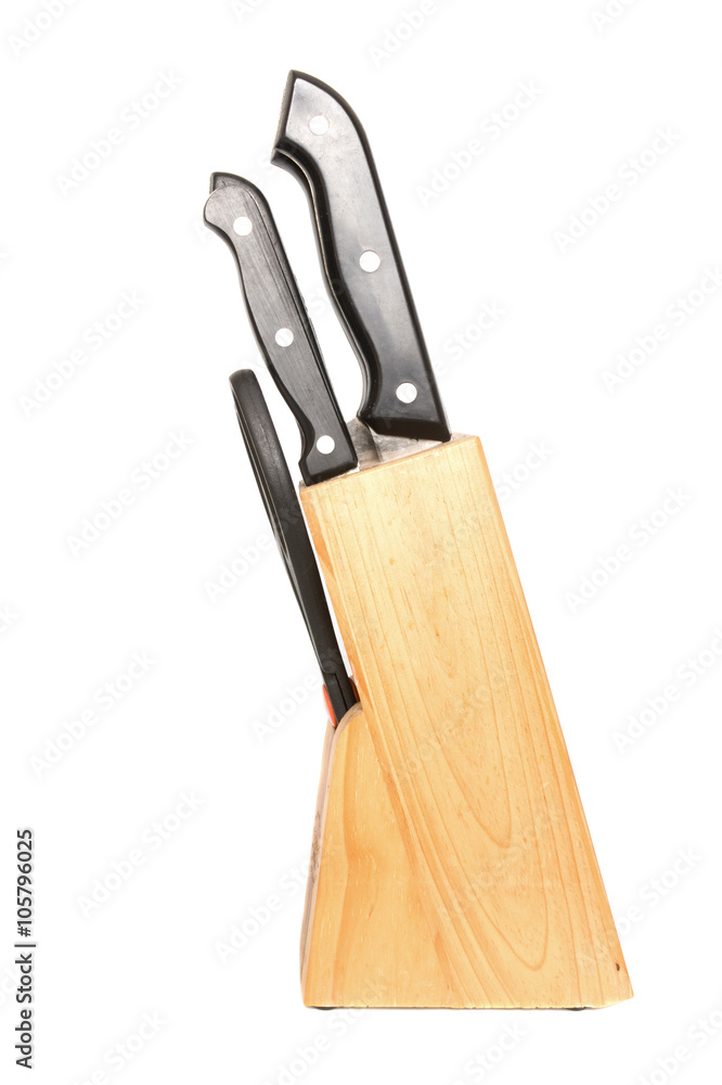 Kitchen knifes on wooden support isolated on the white Kitchen knifes on wooden support isolated on the white