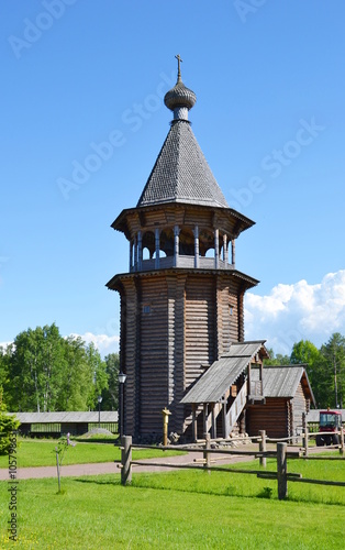 Bell tower in complex Manor Bogoslovka in the style of Russian wooden architecture.