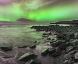 Beautiful Northern Lights Aurora Borealis over coastal landscape