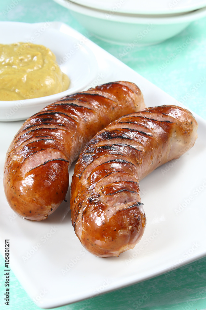 Fried sausage on white plate