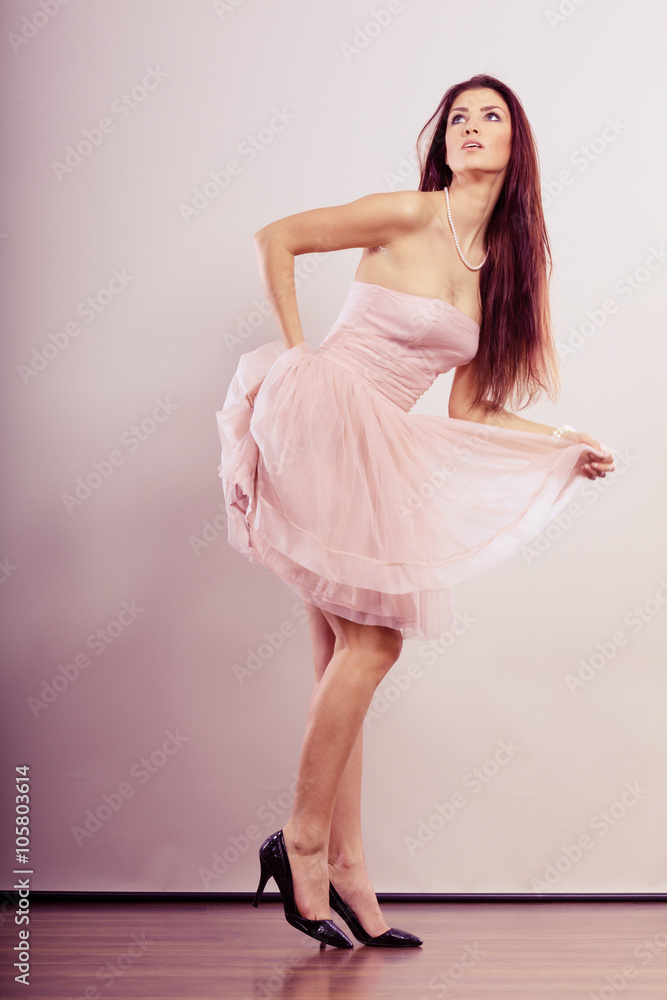 woman in bright dress and high heels shoes woman in bright dress and high heels shoes