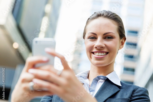 Free Download Portrait of business woman smiling outdoor - GFXLoad