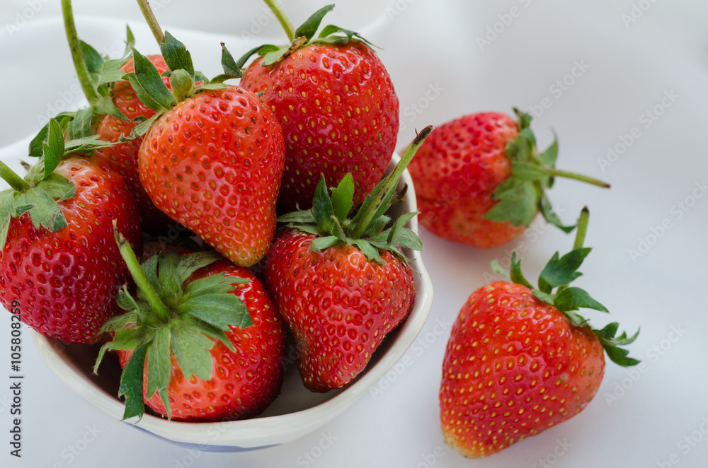 Fresh Strawberries In Bowl On White Fabric Background. Fresh Strawberries In Bowl On White Fabric Background.