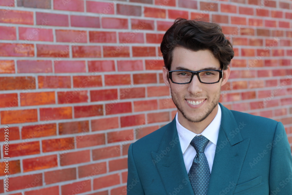 Handsome man face with a white perfect smile with a red background wearing glasses or bifocals Handsome man face with a white perfect smile with a red background wearing glasses or bifocals